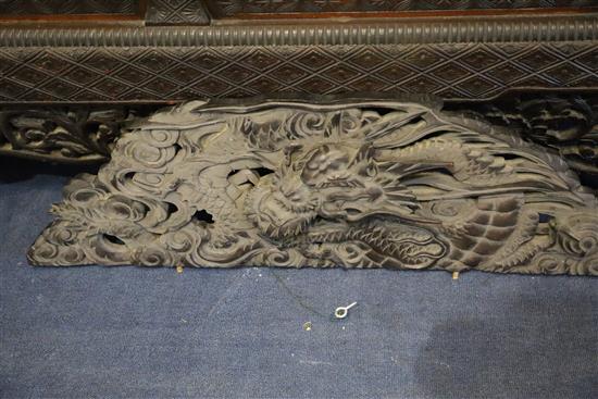 A Japanese Meiji period carved wood and shibayama cabinet, W.4ft 10in. D.1ft 4in. H.7ft 11in.